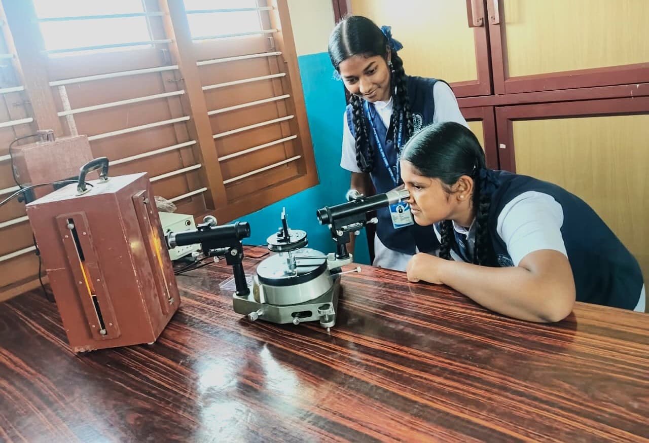 Student Doing Physics Experiment